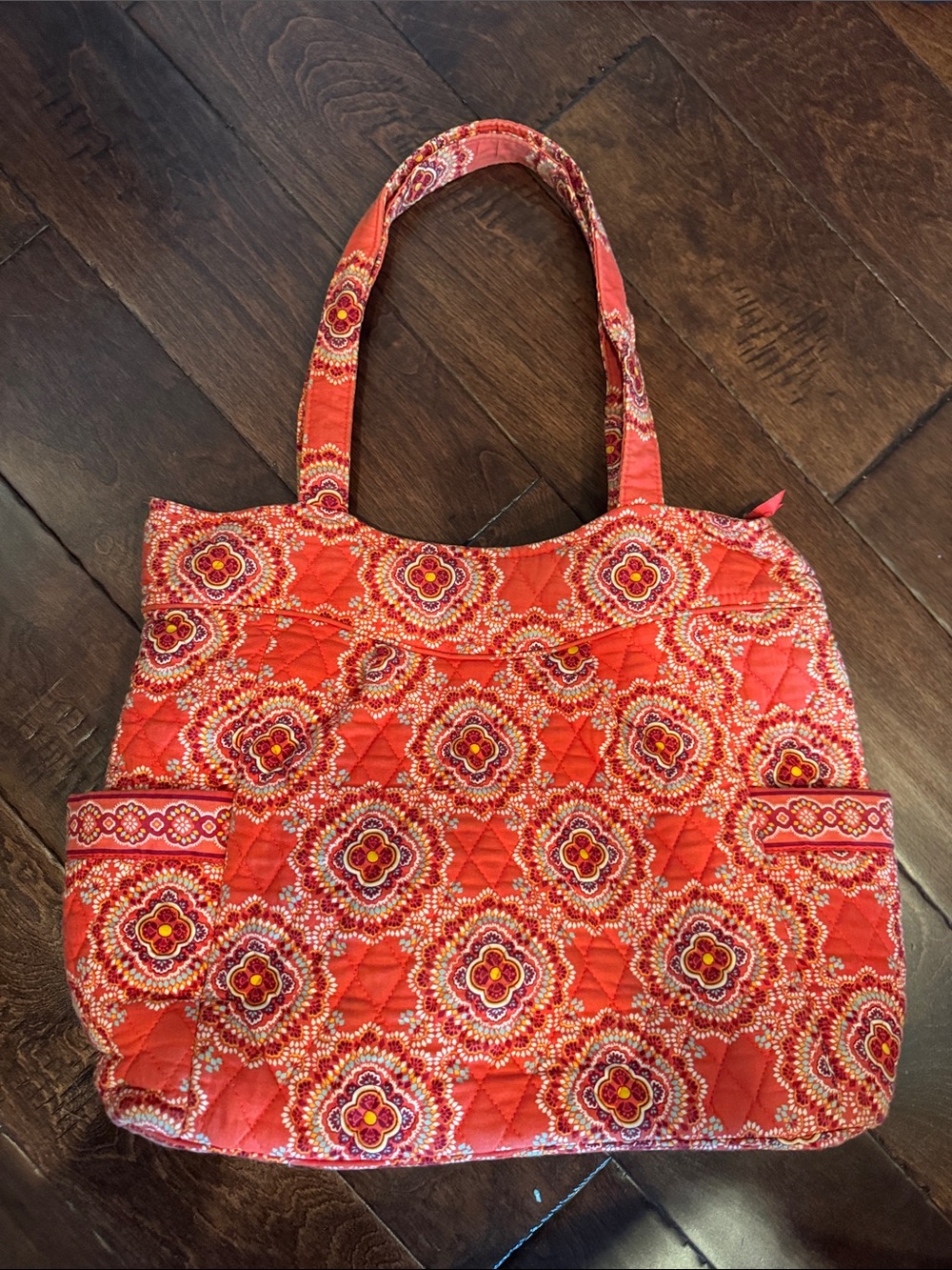 Vera Bradley by with two outside pockets for water bottle, baby bottle etc…